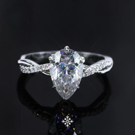 VVS Moissanite Twisted Pavé Pear Cut Ring