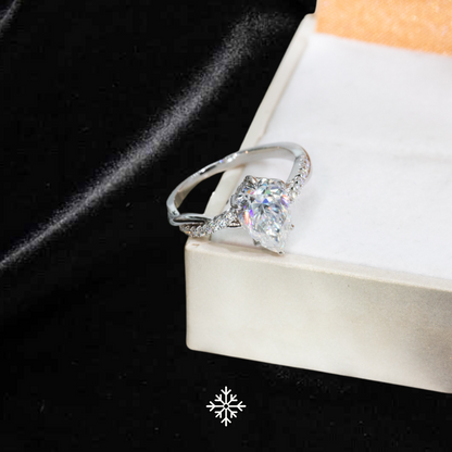 VVS Moissanite Twisted Pavé Pear Cut Ring