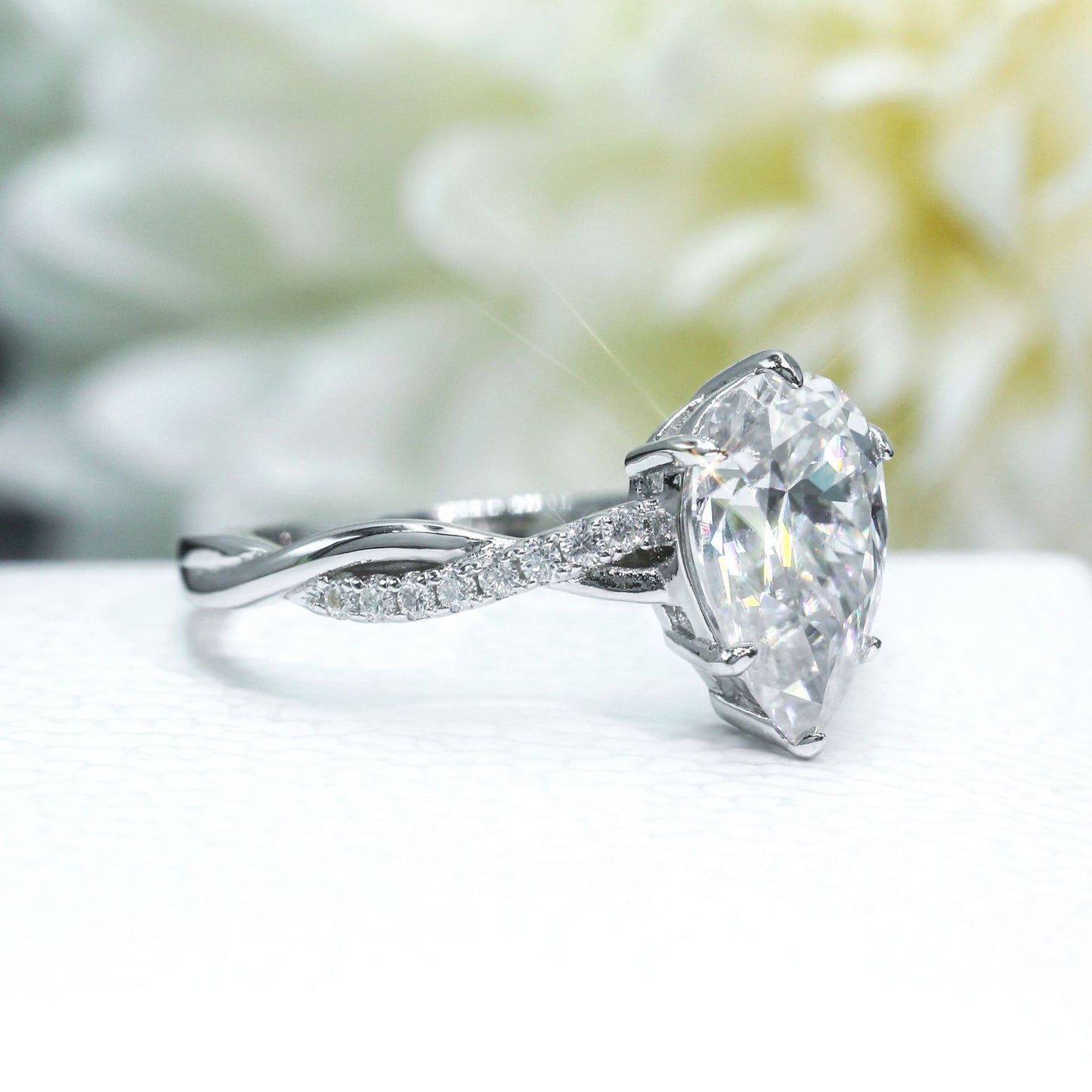 VVS Moissanite Twisted Pavé Pear Cut Ring